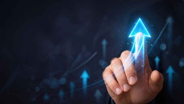 Human hand touching a vibrant blue arrow symbolizing exponential business growth and future success