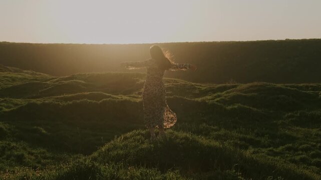 Woman Twirling Across Sunlit Hills, Carefree Movement And Flowing Dress Highlighted By Warm Backlight, Joyful