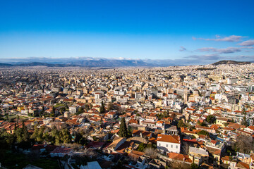 Fototapeta premium Cityscape view of Athens, Greece as seen from the top of the Acropolis of Athens site.