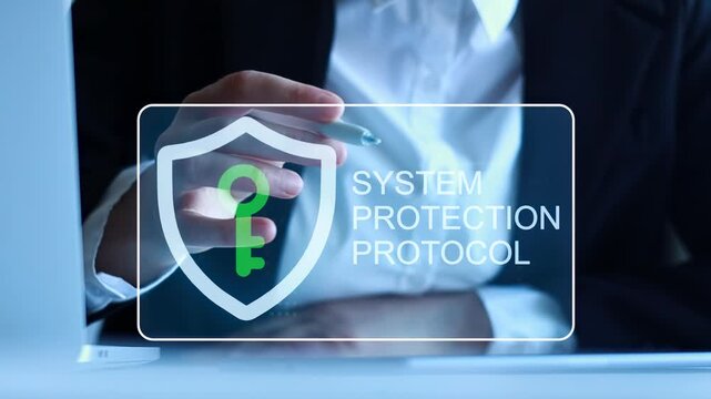 System protection protocol displayed on a tablet with a person holding a pen during a work session in an office.