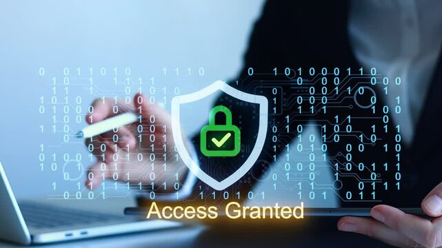 Hands typing on a laptop while digital security symbols show access granted in a tech environment.