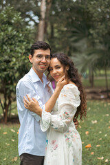 Naklejka premium Romantic portrait of smiling young couple