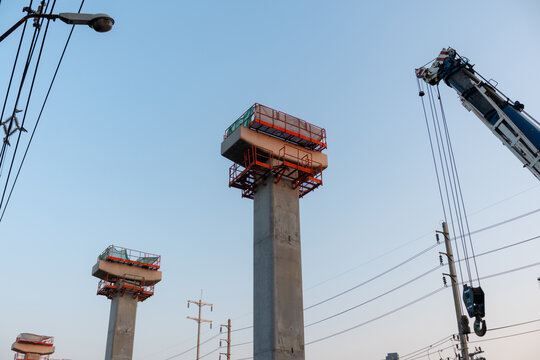 The construction of concrete columns for laying the railway tracks.Blur focus.