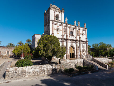 The mission church stands in the oasis town of San Ignacio, Baja California, Mexico showcasing its structure and surrounding area on a clear day