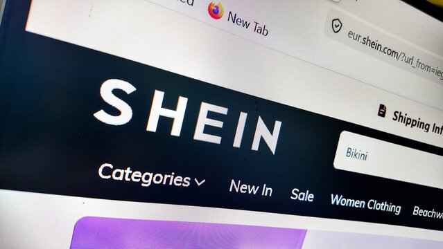 a computer screen with shein website displayed