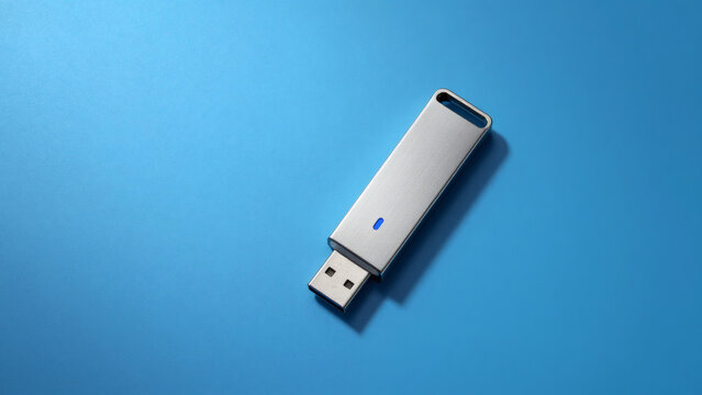 Cl&eacute; USB argent&eacute;e avec indicateur LED bleu sur fond bleu