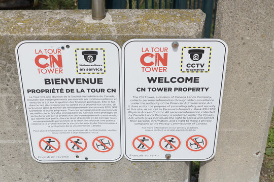 French and English welcome signs at La Tour CN Tower, 290 Bremner Blvd, Toronto