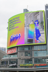 Naklejka premium digital billboard featuring advertising for glean artificial intelligence on the exterior of The Tenor, a shopping mall, facing Sankofa Square, Toronto