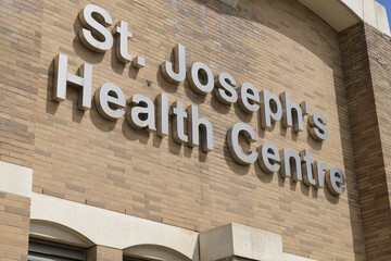 Naklejka premium sign outside St. Joseph's Health Centre, a general hospital, located at 30 The Queensway in Toronto