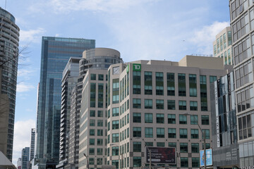 Naklejka premium looking west on Front St W to office complex incl sign at TD Insurance, 320 Front St W, Toronto