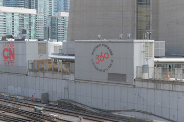 Naklejka premium CN Tower signs (360 The Restaurant at the CN Tower) facing Union Station Rail Corridor, Toronto