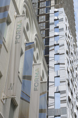 Naklejka premium banner signs FORMA condos (east tower) designed by Frank Gehry at Duncan (Ed Mirvish Way) and King St W, features shimmering metal ribbons and glass, Toronto