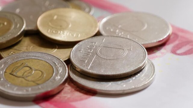 Banknote details of Hungarian forint and coins. High quality 4k footage