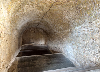 Fototapeta premium Stone vaulted staircase inside the New Fortress in Corfu Town Greece.
