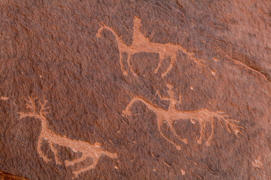 Petroglyphs with deer and horseback figures, Canyon de Chelly