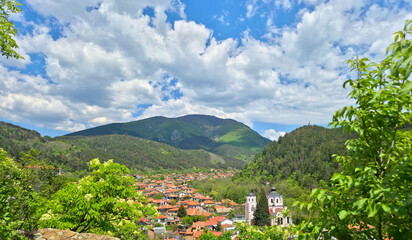sunny view from above, red roofs and orthodox church, mountain, blue sky,  © MPopova