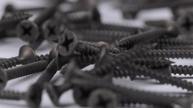 Metal mounting screws close-up. Macro image.