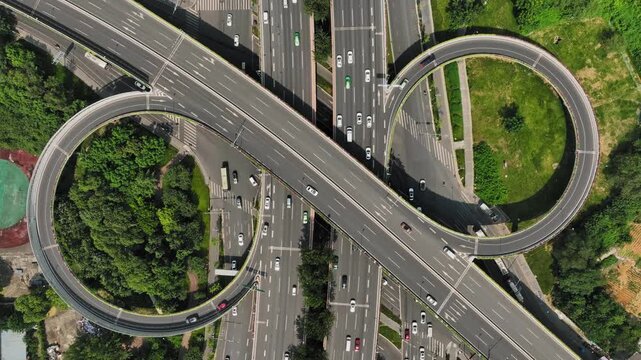 Aerial View of Urban Highway Interchange with Circular Ramps