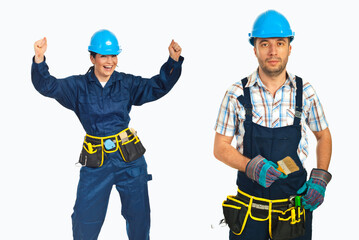 Fototapeta premium Two construction workers celebrate with raised fists