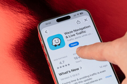 Open Waze navigation app on iphone smartphone