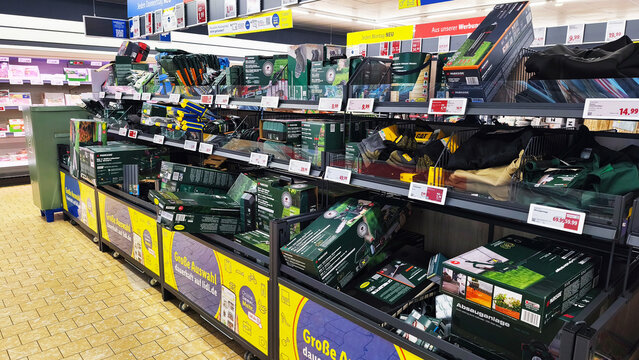 Iserlohn, Germany &mdash; April 08 2026: various Parkside garden tools and power equipment on display shelves inside a Lidl supermarket.