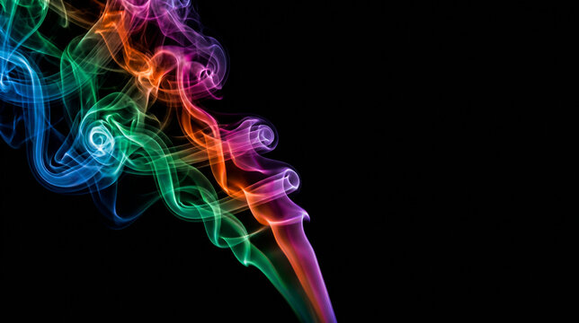 Colorful smoke trails swirling on black background with right side copy space for text