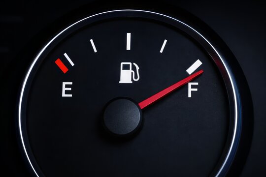 Fuel Gauge Showing Empty Level with Low Fuel Warning Indicator

