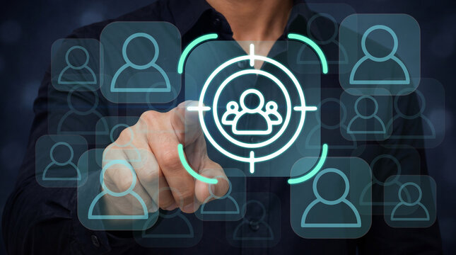 Customer targeting and audience engagement marketing. Analysis of customer profiles, audience segmentation, user interaction, client acquisition. Marketer using digital interface for targeting.