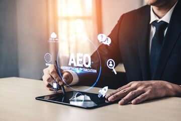 Naklejka premium Professional Businessman Using Tablet for Answer Engine Optimization Strategies in Modern Digital Workspace Fluxor.