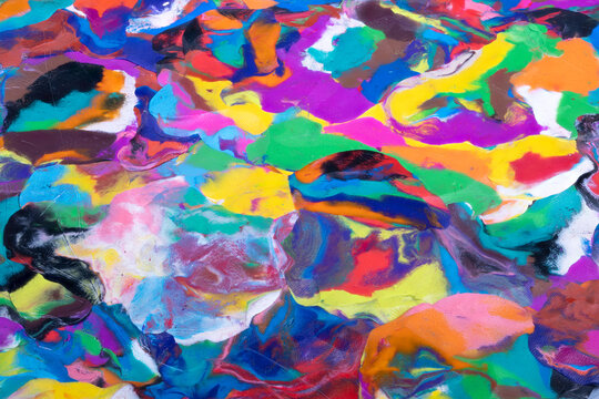 Playful colorful clay fragments inspire childrens craft workshop, tactile handmade pieces, cheerful palette and smear marks encourage creativity and playful exploration