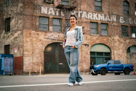 young woman walking on the street