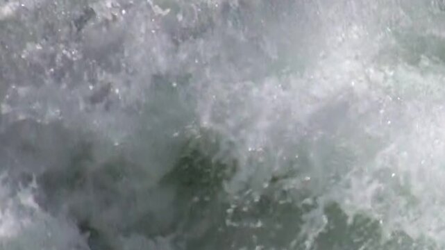 Wild, churning water rushes and froths down a steep cascade. A flurry of white water explodes against rock face in Waterfall Canyon creating a mesmerising and powerful show of nature.