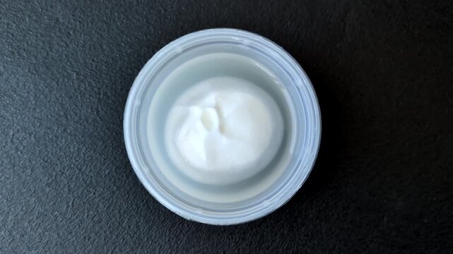 Fresh white burrata cheese with tomatoes for a salad. Burrata cheese as a food background for your design