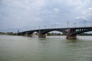 Fototapeta premium Scenic view of the Rhine River with the Theodor Heuss Bridge crossing the water near Mainz city center. Mainz, Rhineland-Palatinate, Germany