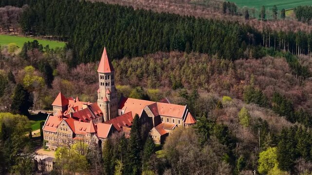 A panoramic Aerial view of the city and castle Clervaux in Luxembourg, on a sunny spring noon