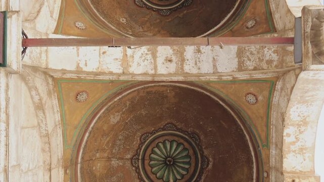 Ornate mosque ceiling and hanging lamp in Cairo, Egypt, captured in slow motion 4K during travel.