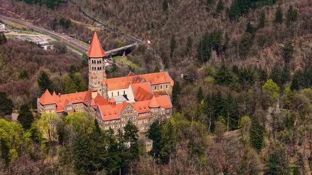 A panoramic Aerial view of the city and castle Clervaux in Luxembourg, on a sunny spring noon