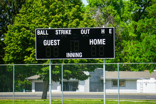 Baseball and softball sports scoreboard at park