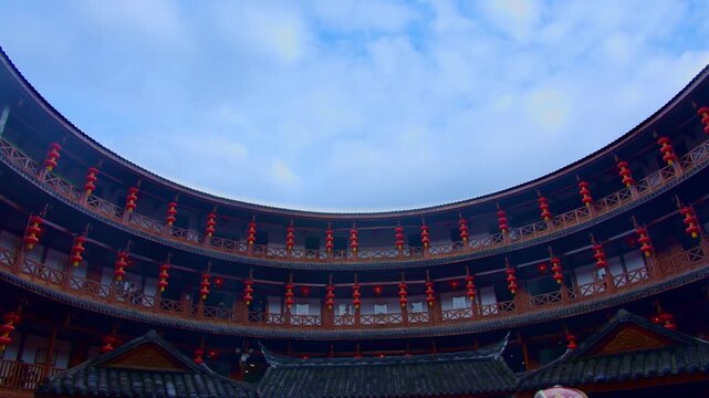 Traditional Hakka Tulou Courtyard with Red Lanterns in Fujian, China