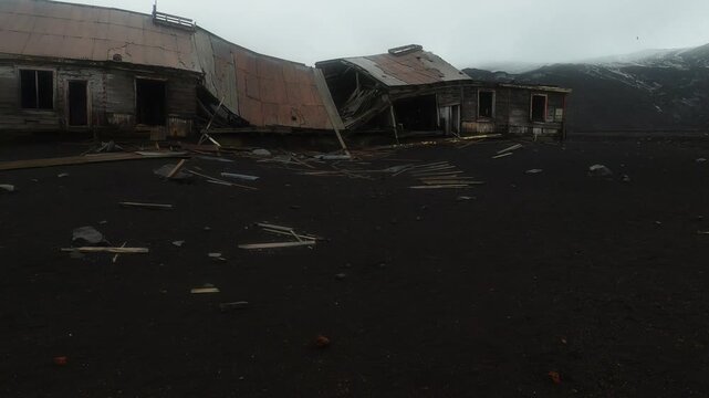 Ruins of abandoned British research station (originally Norwegian whaling station) on Deception Island in Antarctica, South Shetland Islands 