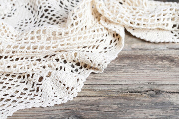 Obraz premium A beautiful lace on wooden background, copy space.