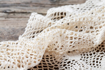 Fototapeta premium A beautiful lace on wooden background, copy space.