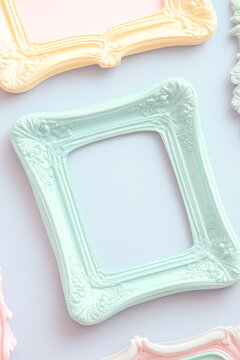 A collection of variously colored picture frames hanging on a wall, ideal for a photography studio or home decor vertical frame
