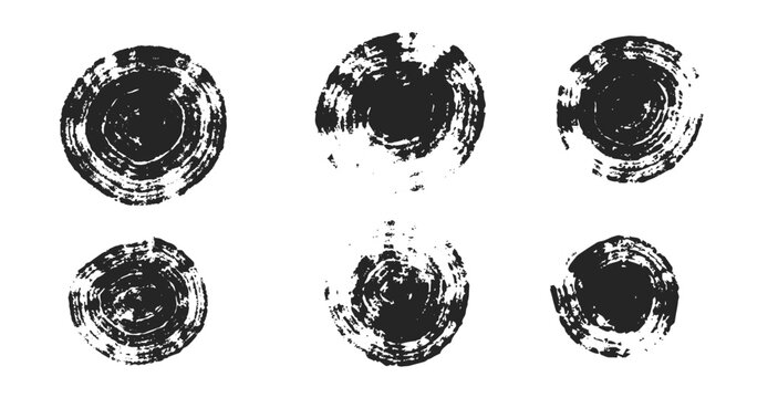 A set of hand-drawn circles created with grunge-style dry brush strokes.