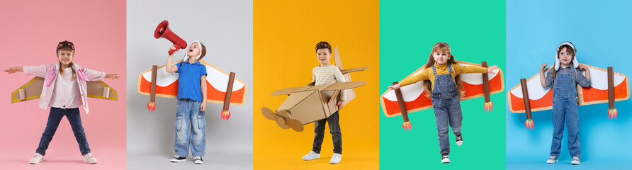 Cute children playing airplane pilot. Collection of portraits on colorful backgrounds. Fun science for kids © New Africa