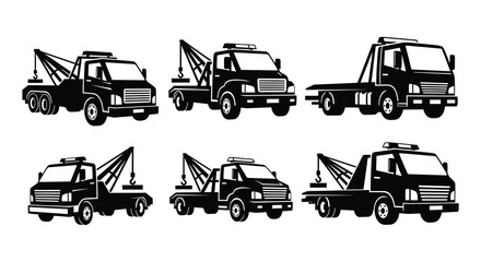 Variety of tow trucks depicted in a stark black silhouette © Jesmin