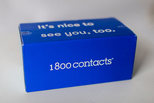 a blue box package with 1800 contacts subscription on white background 