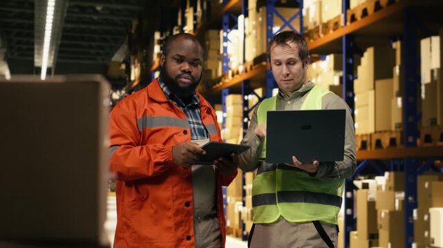Multiethnic team, logistics on laptop and tablet, reviewing order fulfillment, colleagues monitoring shipment details and tracking info with AWB labels. Package tracking, depot operations.