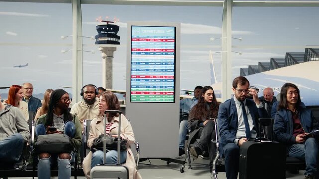 Waiting, delayed flight and multiethnic crowd in airport at departure gate, global disruption. Upset, cancelled international flight and tourists in air transportation transit hub, camera A