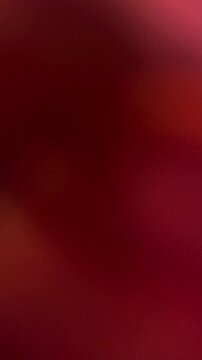 Soft romantic red gradient background with smooth minimal motion